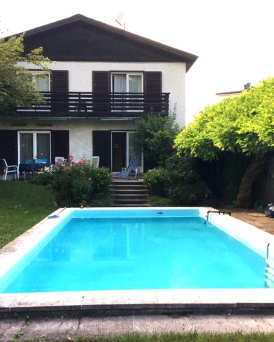 NONNTAL | Charmantes Einfamilienhaus mit blickgeschütztem Garten und Pool in bester Lage